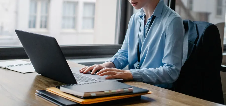 Checking a roofing company's trading history on the Companies House register from a laptop