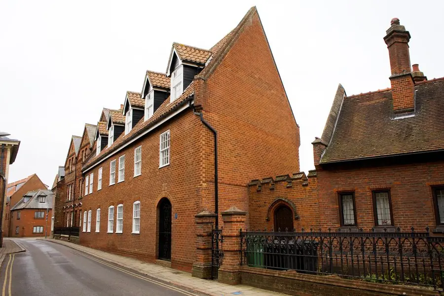 Historic brick buildings on an English town street of the kind covered by conservation area controls