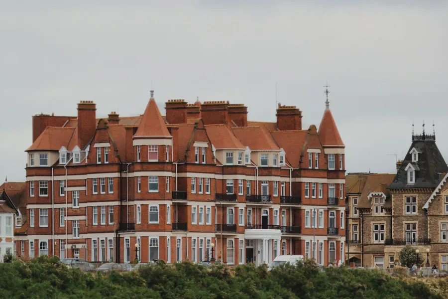 Exposed Victorian seafront roofline with steep slopes and chimneys typical of Southport's Promenade properties