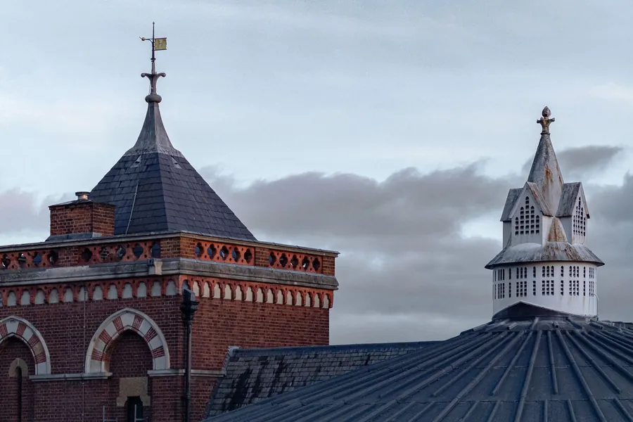 Victorian red brick building with slate roofs and turrets, typical of the period streets that Southport's conservation areas protect