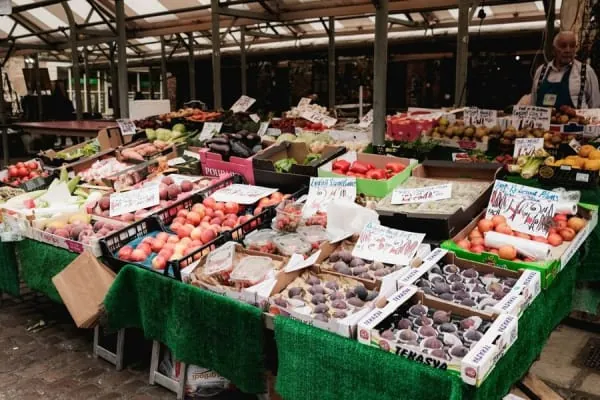 Covered market stalls piled with fresh produce, the scene Ormskirk's twice-weekly market has made for centuries