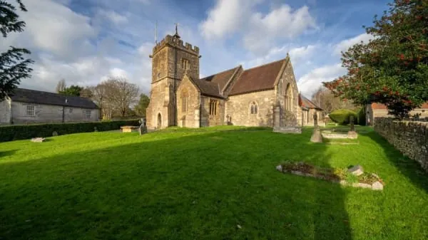 An old stone parish church and churchyard, in the manner of St Andrew's at Maghull
