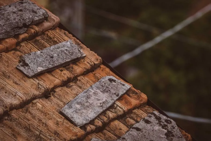 An aged roof covering that has reached the end of its life