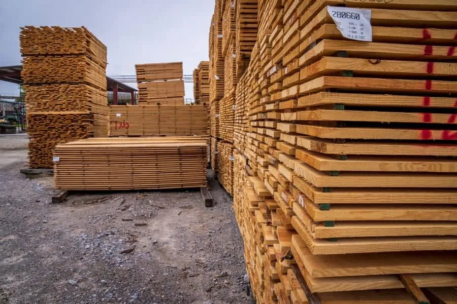 Insulation and timber boards stacked at a builders merchant