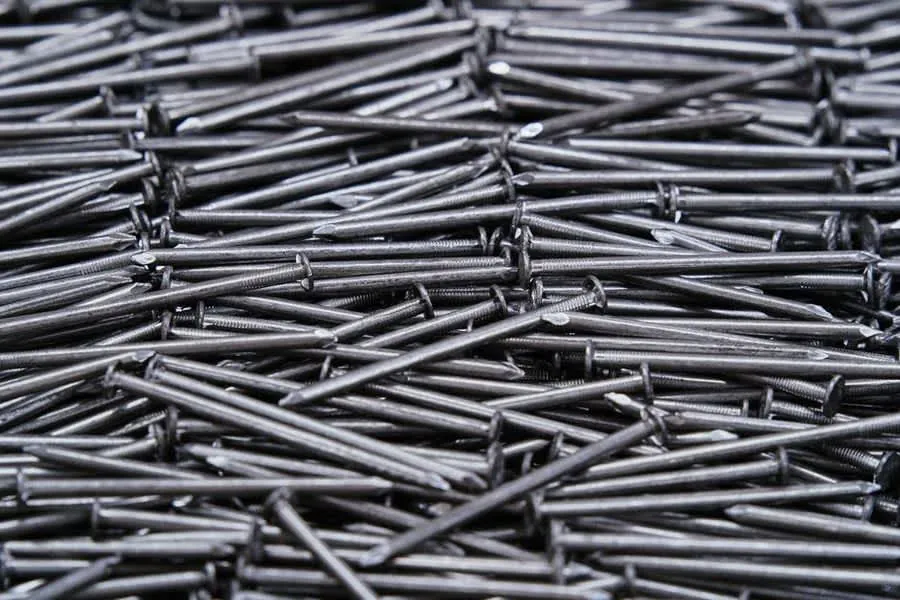 Roofing nails and coastal-grade fixings used to hold slates and tiles on a Southport roof
