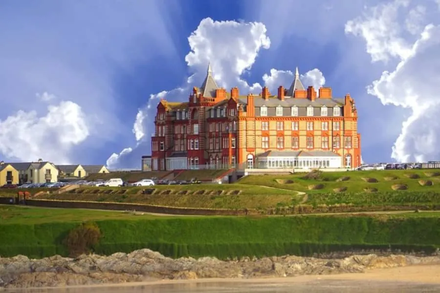 Large Victorian seafront hotel building with a complex roofline and chimney stacks
