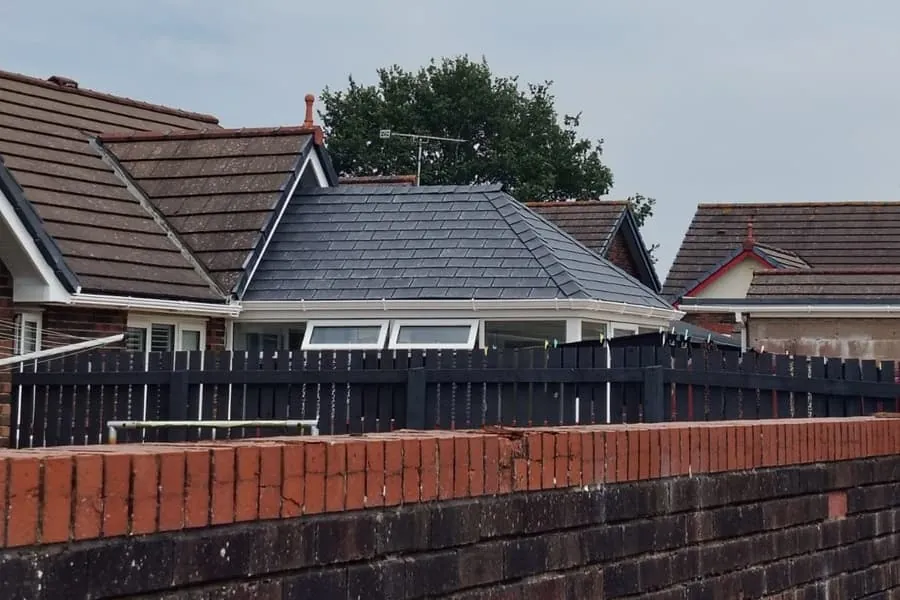 A solid tiled roof fitted to a conservatory at the rear of a Southport home
